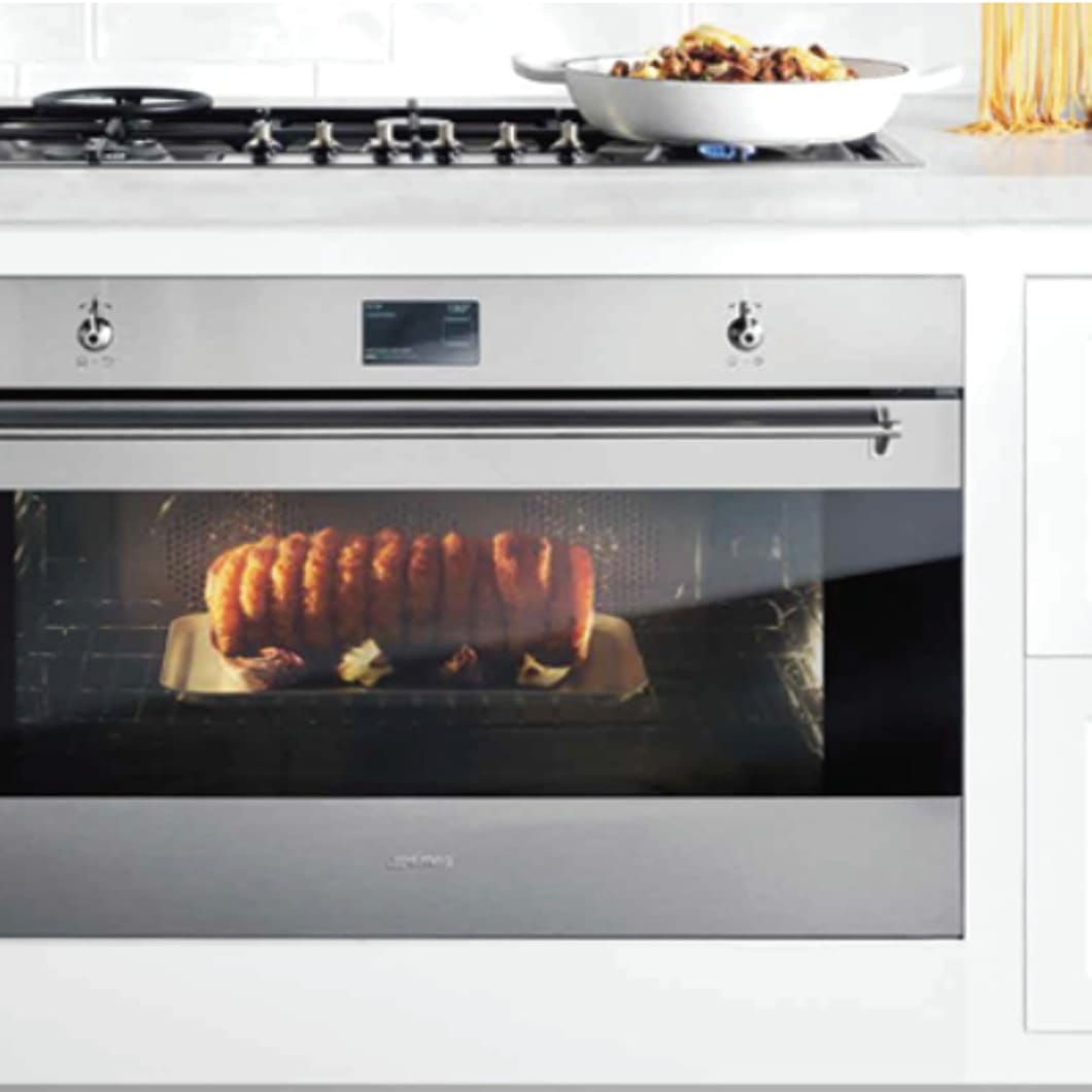 Built-in oven with food cooking — example showing the appliance in use, useful for fault context